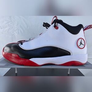 Jordan White and Black Athletic Sneakers with Red Accents